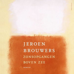 Zonsopgangen boven zee